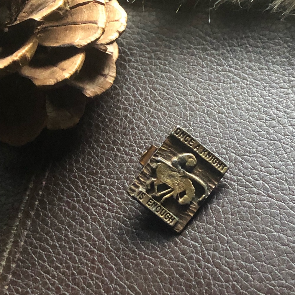 Vintage brass “ONCE A KNIGHT IS ENOUGH” tie bar clip